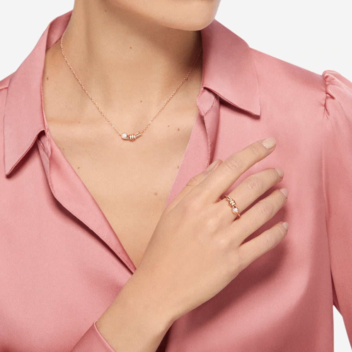 anello nodo oro rosa & diamante bianco