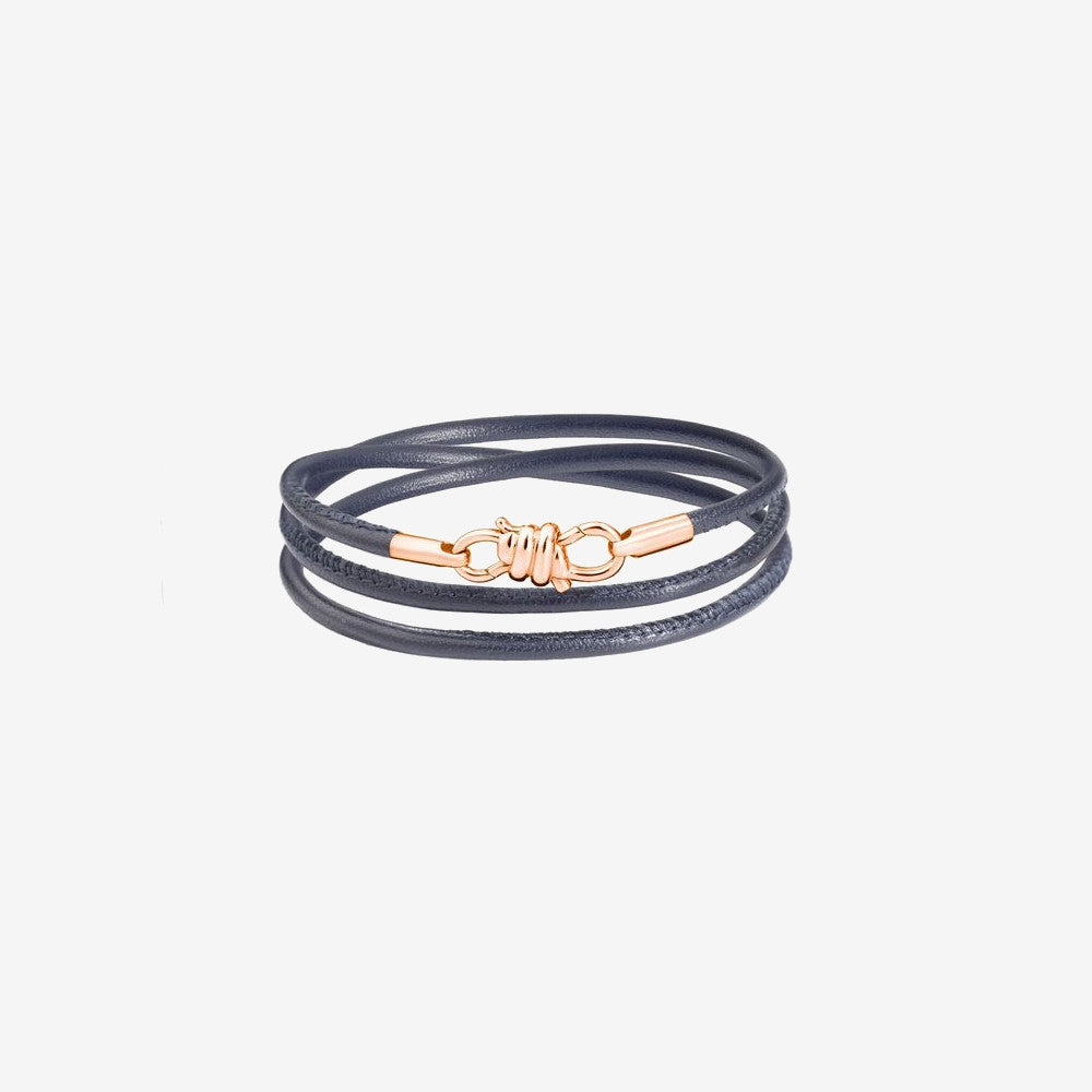 bracciale nodo in oro rosa e nappa in pelle grigia