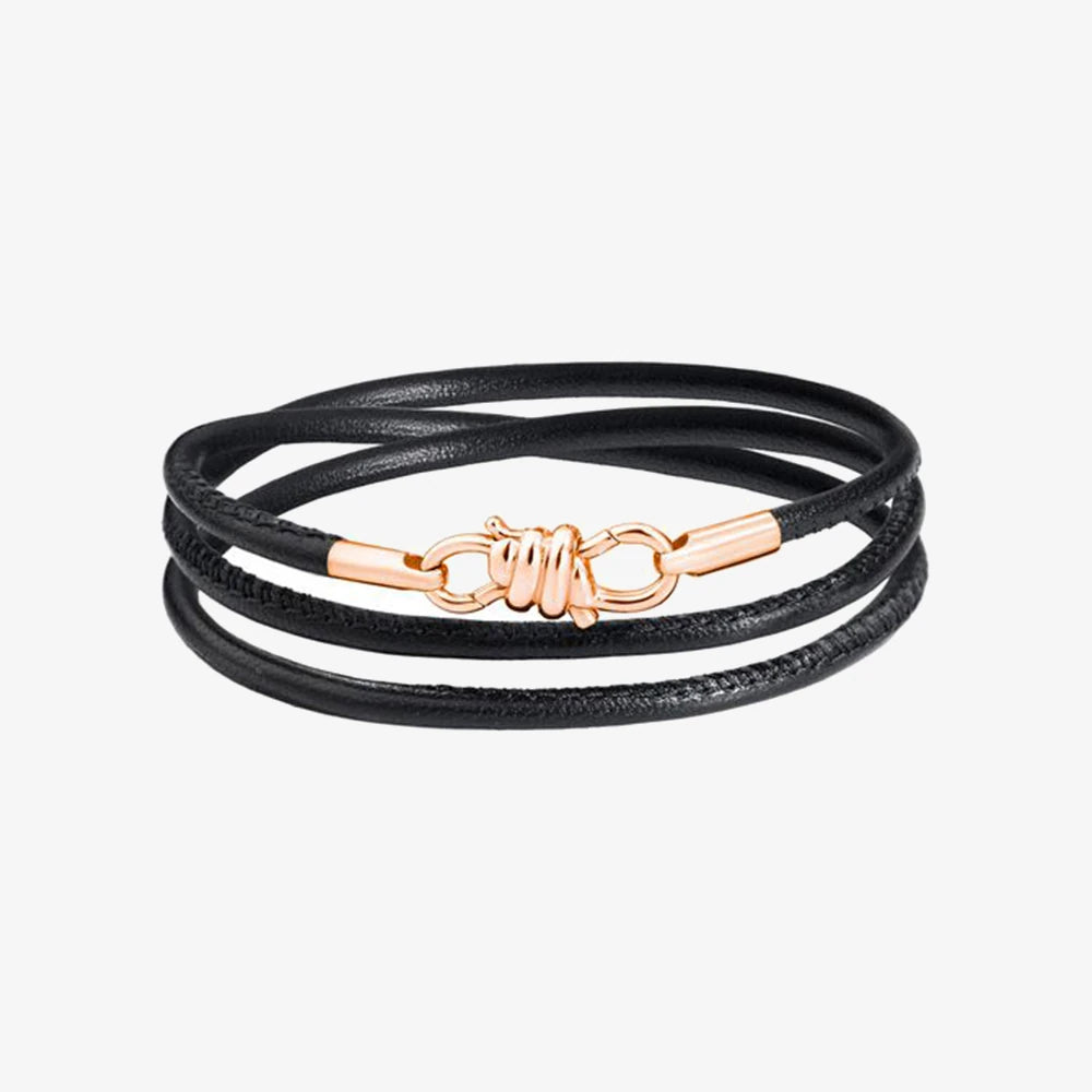 bracciale nodo in oro rosa e nappa in pelle nera