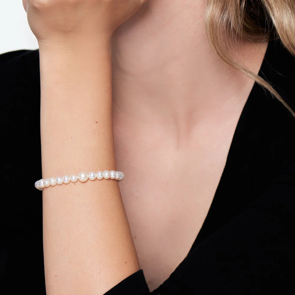 Bracciale Elastica con Perle Bianche di Diverse Dimensioni