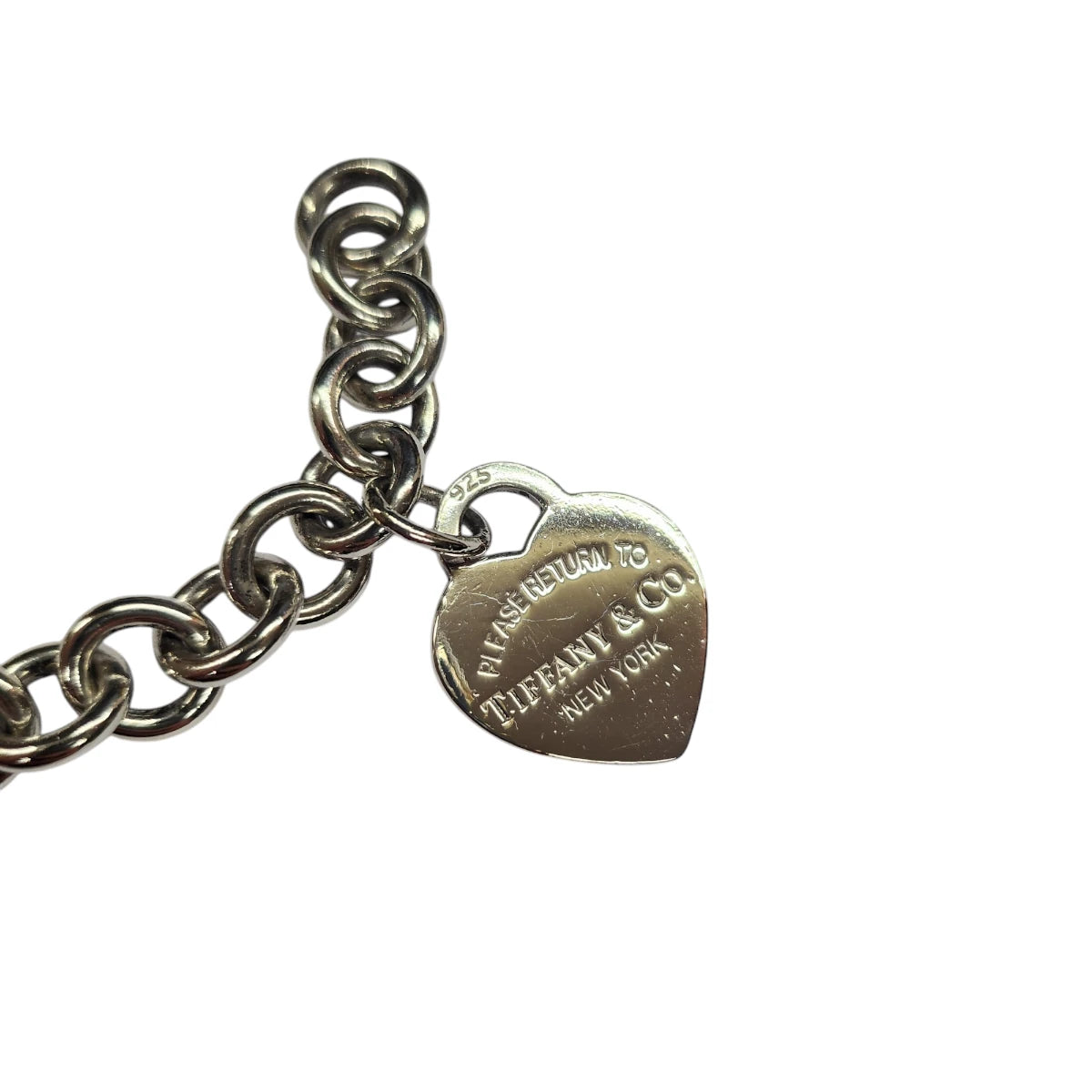 Bracciale Tiffany charm cuore e quadrifoglio