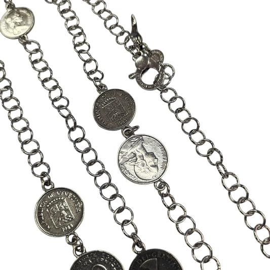 Collana Giovanni Raspini Monete